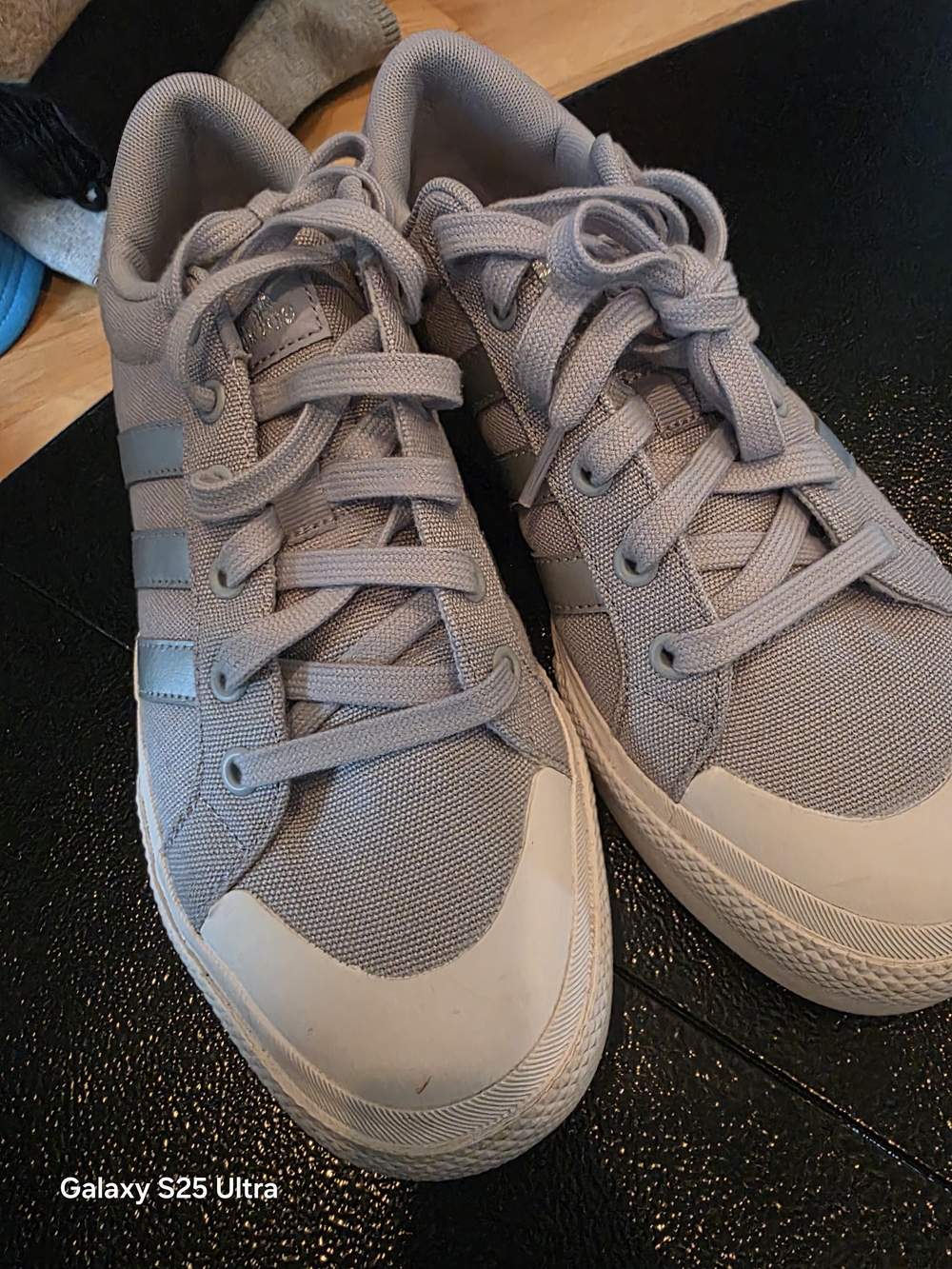 Women's adidas canvas sneaks.